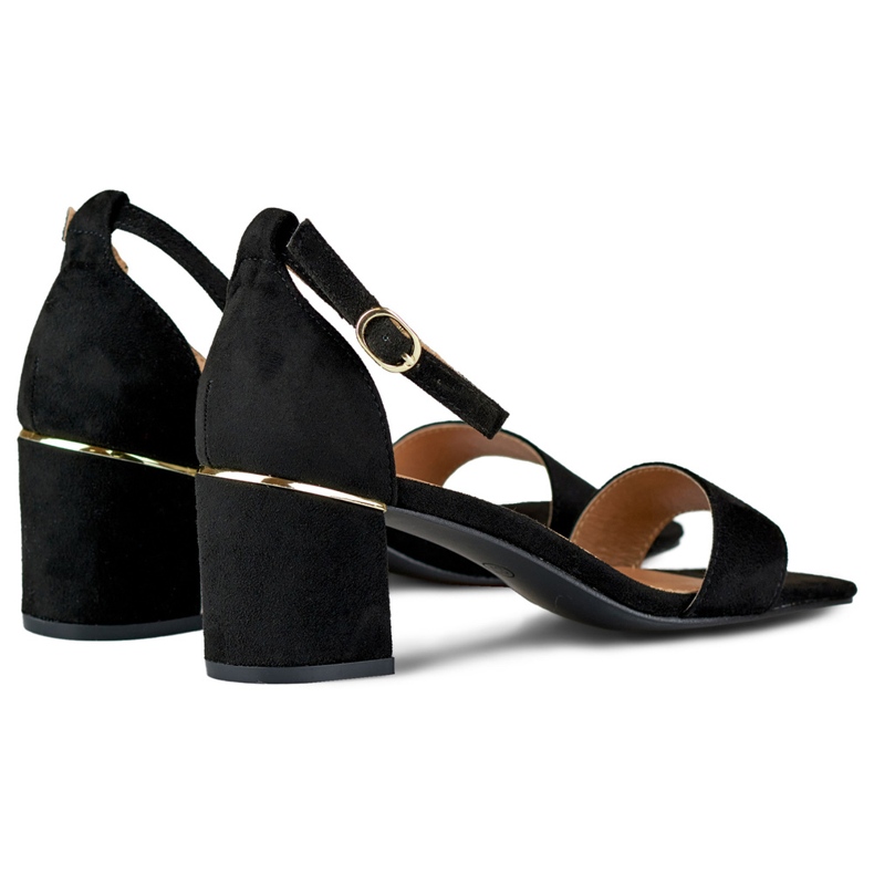 Black sandals on a low heel with a gold detail 1