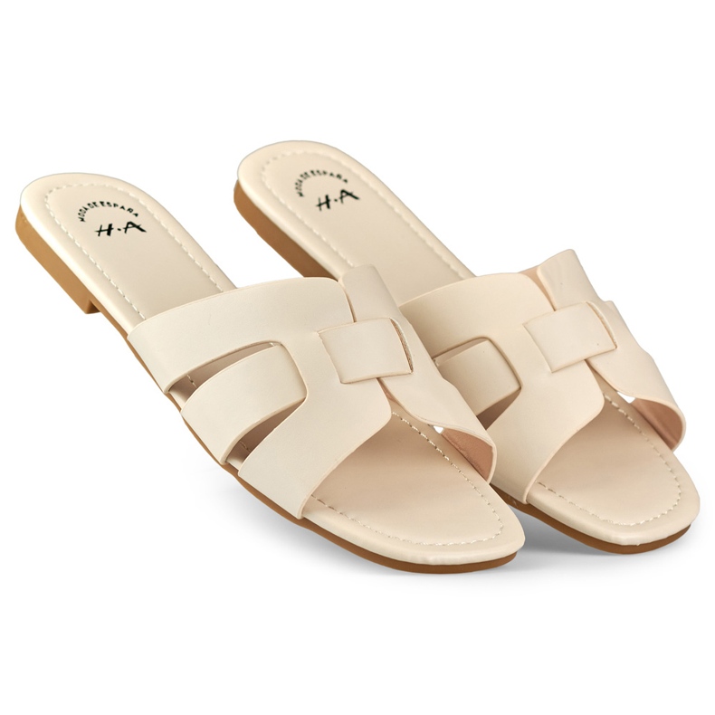 Beige women's slippers with a flat sole 1