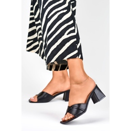 Women's black slippers on a low heel 1