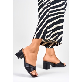 Women's black slippers on a low heel 2