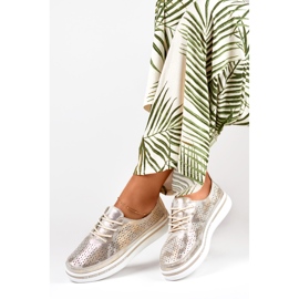 Women's golden sports shoes made of genuine leather 1