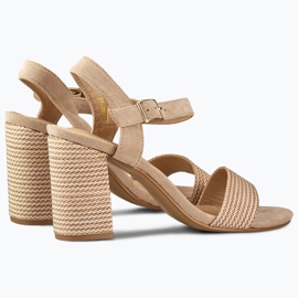 Ladies' beige suede sandals on the post 1