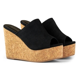 Black flip flops on a cork wedge 1
