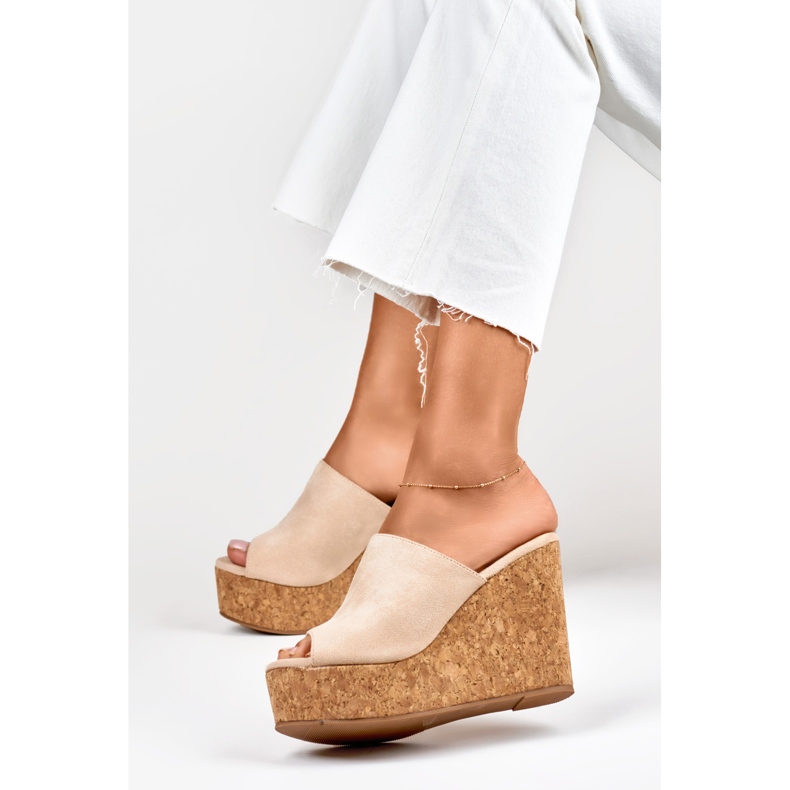 Beige flip flops on a cork wedge 2