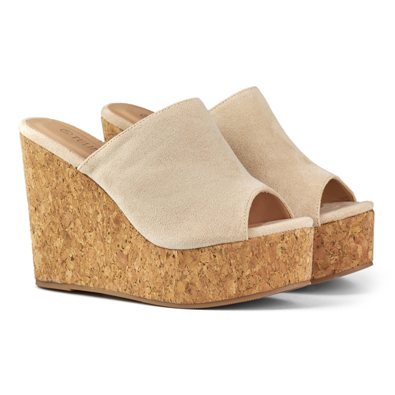 Beige flip flops on a cork wedge 1