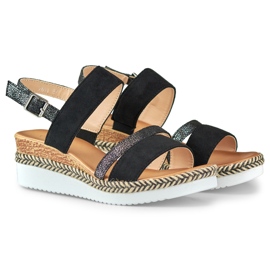 Ladies' black sandals on a low wedge 1