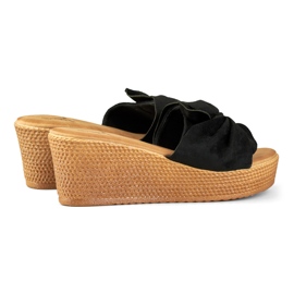 Women's black slippers on a comfortable wedge heel 1