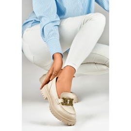 Beige loafers with a gold buckle 1