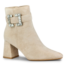 Ladies' beige boots with a decorative buckle 1