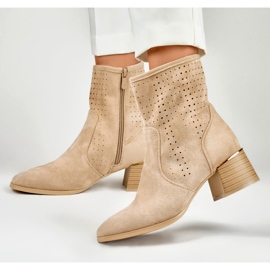 Light beige openwork women's boots on a low heel 2