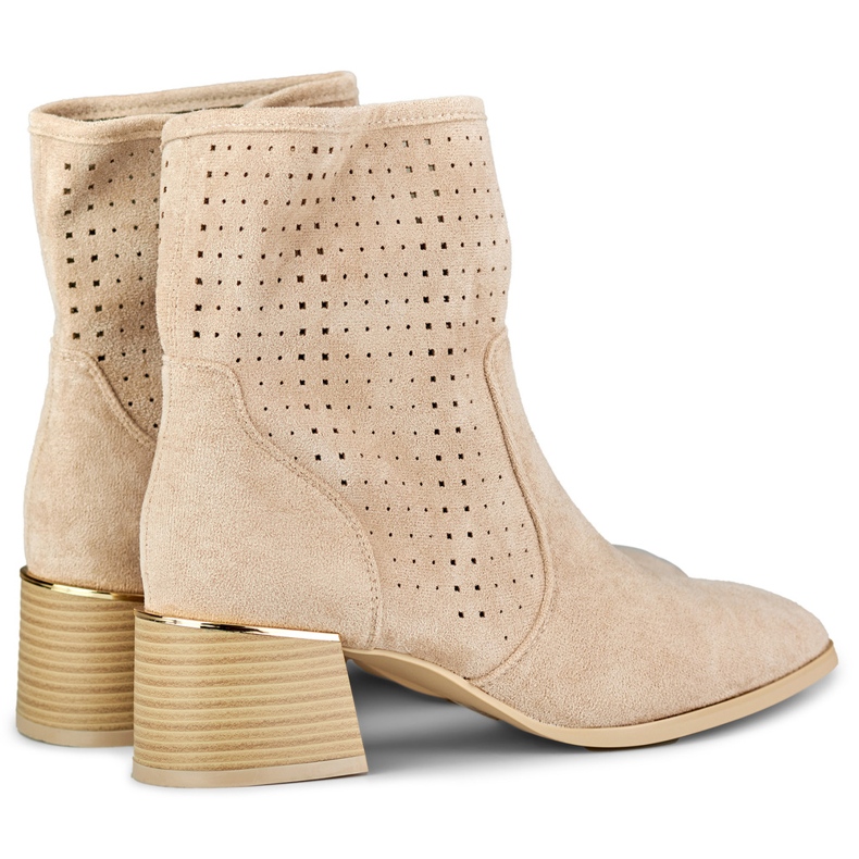 Light beige openwork women's boots on a low heel 1