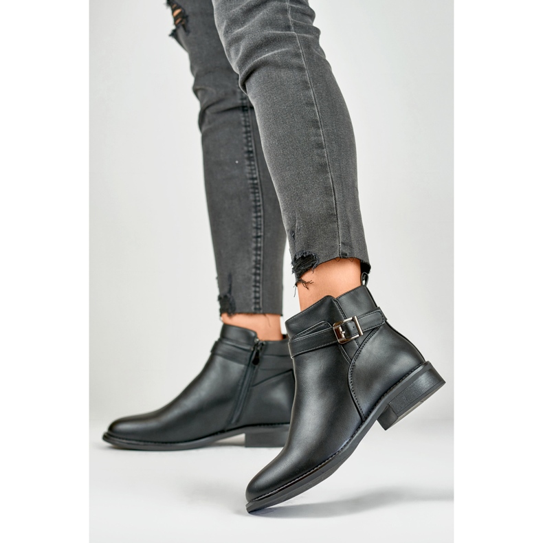Black elegant women's boots with a flat sole 2