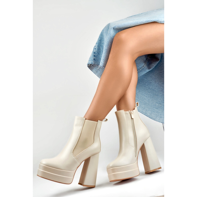 Beige high heel and platform boots 1
