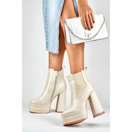 Beige high heel and platform boots 2