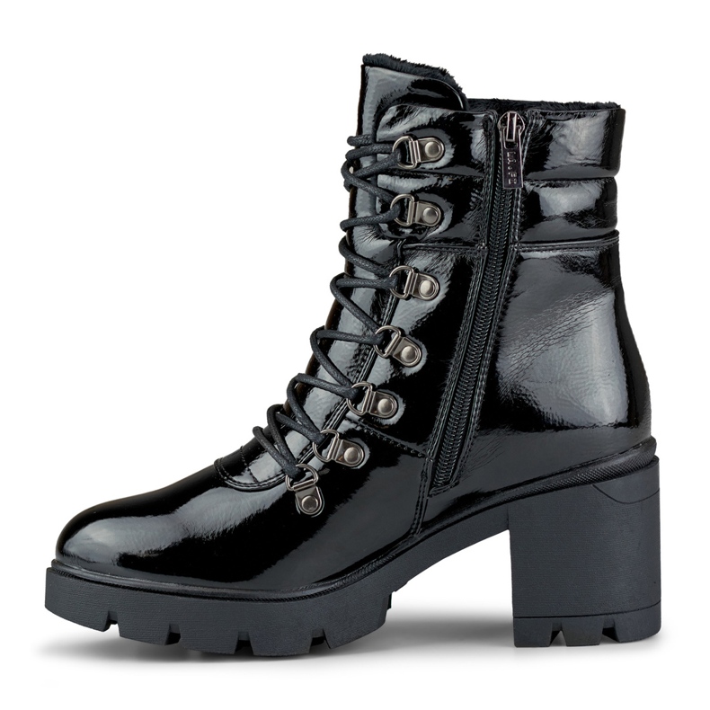 Lacquered black women's boots on the post 1