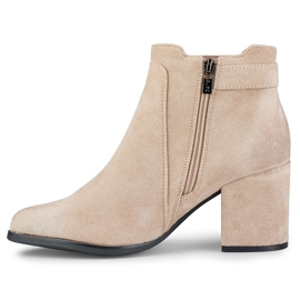 Ladies' light beige boots with a buckle 1