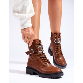 Brown women's lace-up work boots with a decorative buckle 1