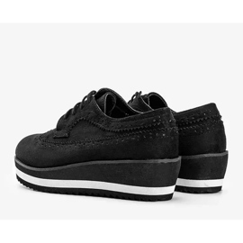 Black suede shoes on a high Camryn sole 3