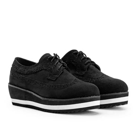Black suede shoes on a high Camryn sole 5