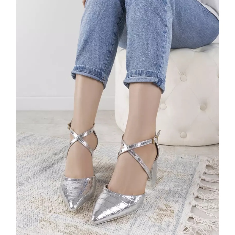 Silver pumps on a Strutt post 2