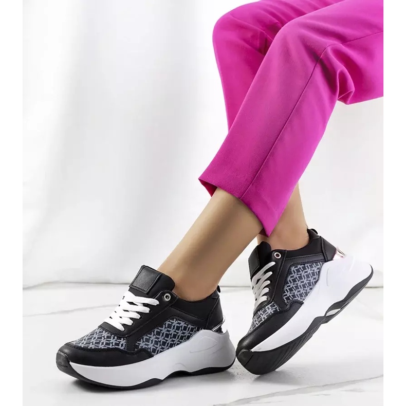 Black sports sneakers from Milan 2