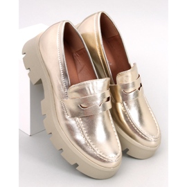 Metallic loafers on the Quant Gold platform golden 1