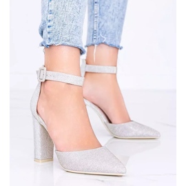 Shiny beige pumps on Mila's post 1