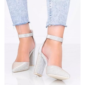 Shiny beige pumps on Mila's post 2