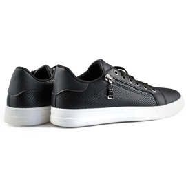 Black sports shoes with a decorative zipper 1