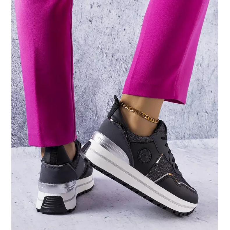 Black sneakers with glitter inserts from Léves 1