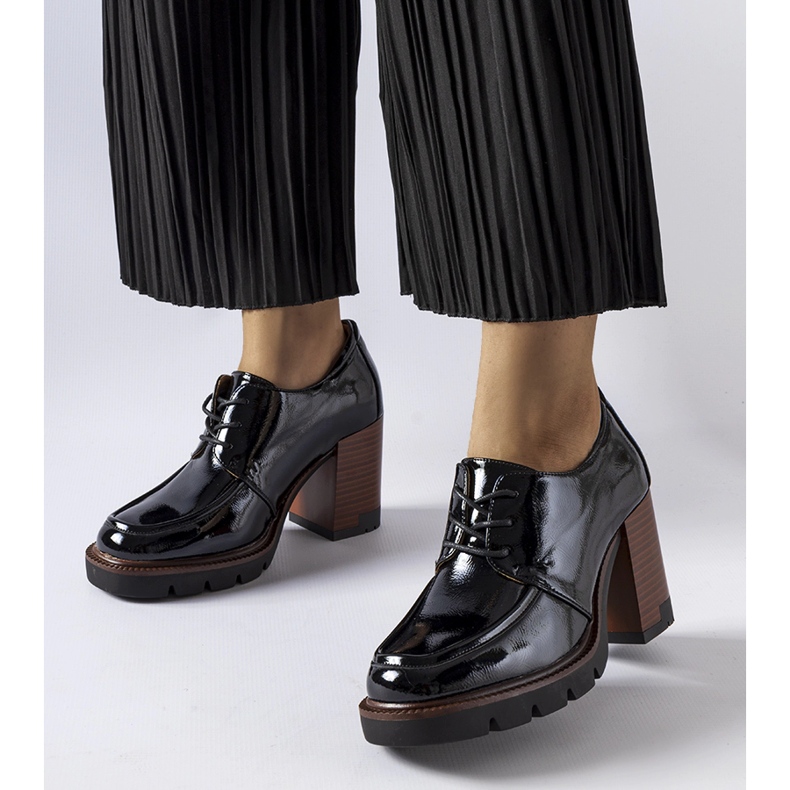 Black patent shoes with a high heel from Vinceza 1