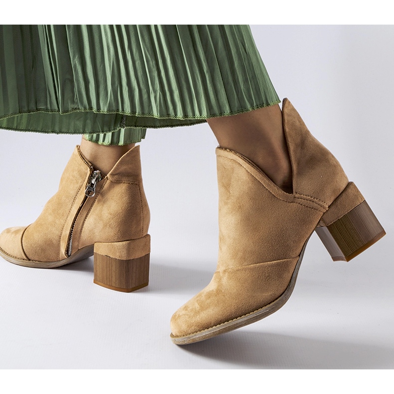 Beige ankle boots with an irregular upper by Busson 2