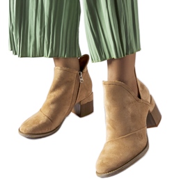 Beige ankle boots with an irregular upper by Busson 1