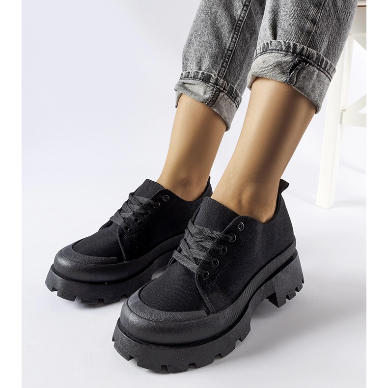 Black shoes with a massive Pointe sole 1