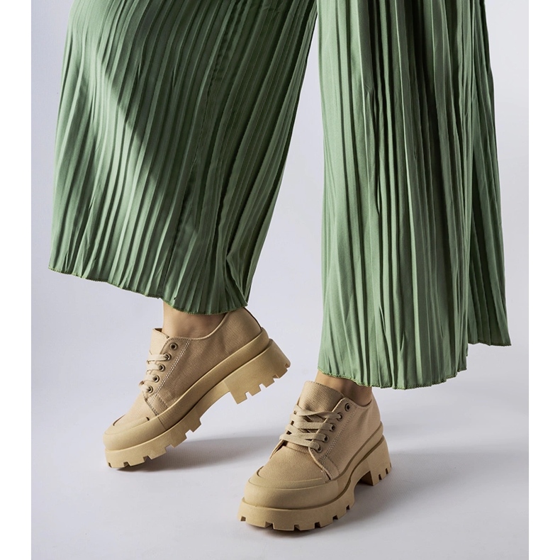 Brown shoes with a massive Pointe sole 1