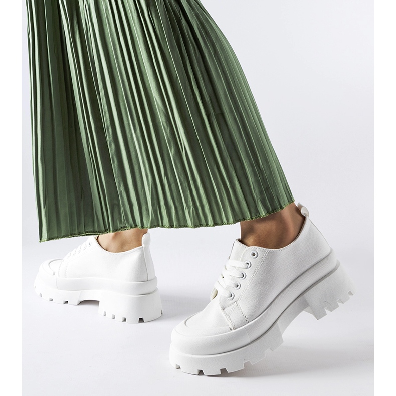 White shoes with a massive Pointe sole 1