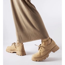 Brown shoes with a massive sole from Coleman 1