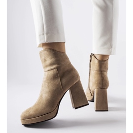 Gray ankle boots on a massive Itaf heel beige 1 Gray ankle boots on a massive Itaf heel beige 1