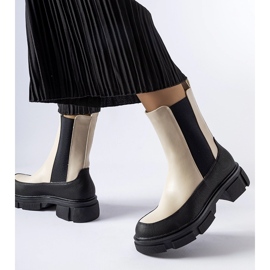 Beige and black slip-on ankle boots by Faisal 1 Beige and black slip-on ankle boots by Faisal 1