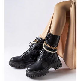 Black boots with pearls and a Mira chain 2