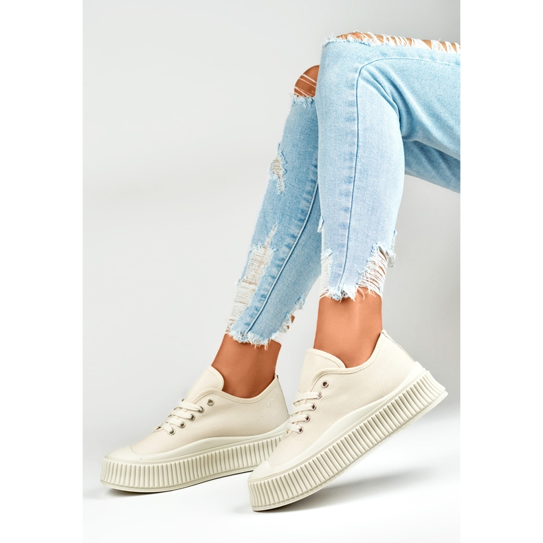 Light beige women's sneakers with a thick sole 1