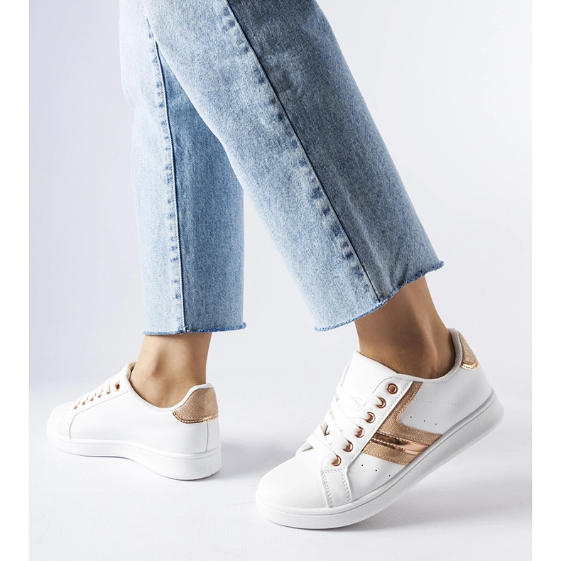 White sneakers with a rose gold Rizzo accent 1