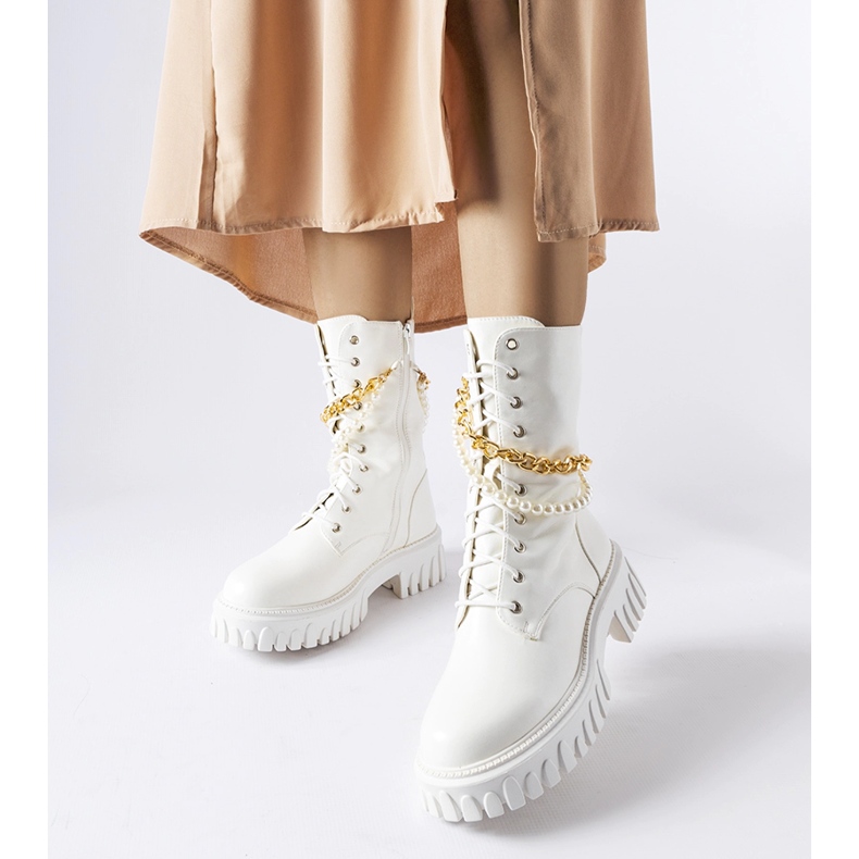White boots with pearls and a Mira chain 1
