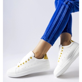 Bushnell white sneakers with yellow accents 1