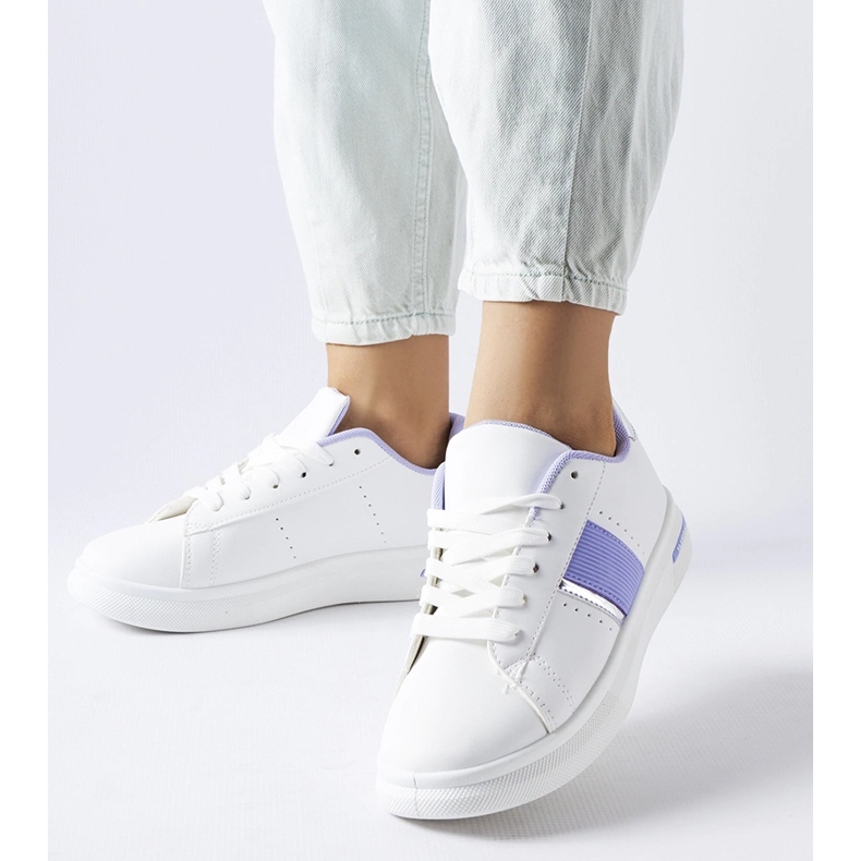 White sports shoes with a purple Marei accent 1 White sports shoes with a purple Marei accent 1