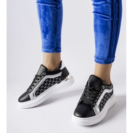 Black sneakers with silver Leo decoration 1