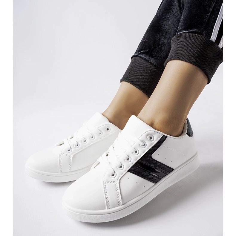 White sneakers with black Rizzo inserts 2