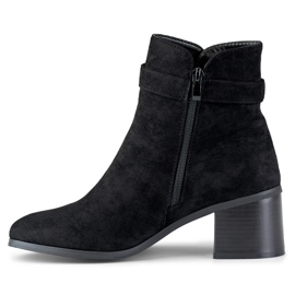 Black low-heeled ankle boots with a buckle 1