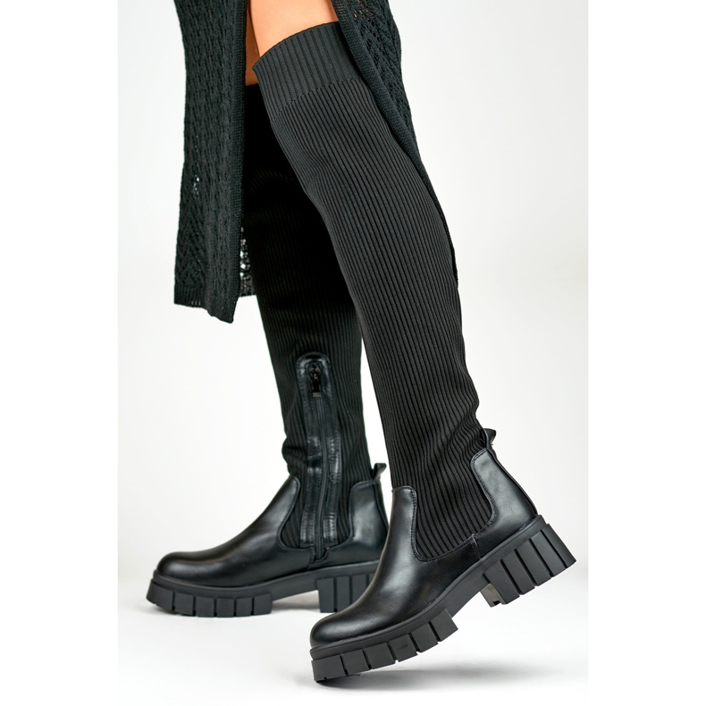 Black over-the-knee boots with an elastic upper 1
