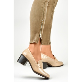 Women's beige shoes with a low heel 1